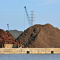 Recycling old metal. Scrap heap along the Ghent-Terneuzen Canal at Ghent seaport, Belgium
